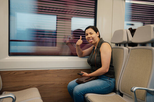Passenger making funny face on train