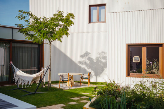 garden with hammock, persian silk tree and terrace