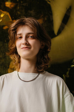 Portrait of Smiling model with nose piercing 