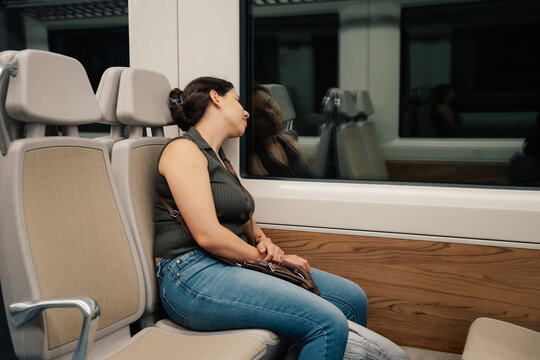 Woman sleeping on a train