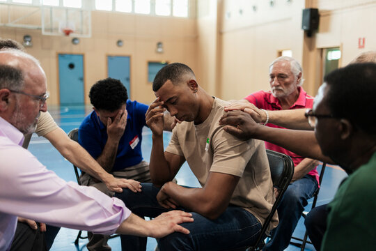 Diverse men finding emotional comfort in support group
