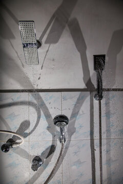 Water sprays out of various showerheads