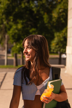 Teenage girl with backpack and school accessories