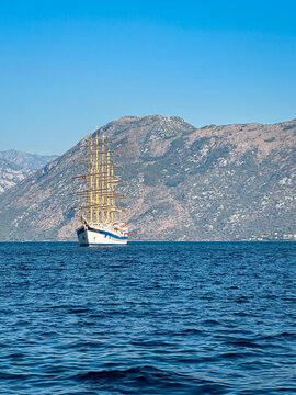 Jadran Tall Ship Sailing in Boka Bay, Montenegro with Dramatic Mountain Landscape