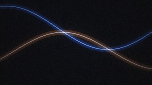Two intersecting glowing light trails in blue and amber forming sine wave curves against a dark black textured background surface