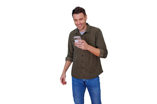 Man smiling, holding and looking at his mobile phone screen, connecting and communicating using technology. Transparent background