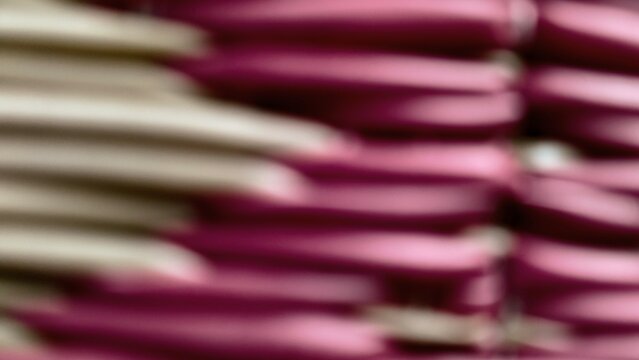 an abstract, soft-focus background featuring a blend of deep magenta, pink, and cream white horizontal lines. This high-quality blurred texture creates a modern, minimalist backdrop perfect for graphi