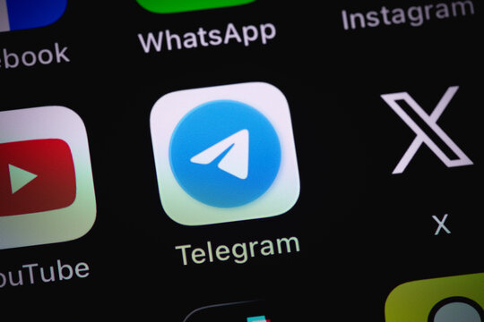 Telegram icon mobile app on a screen closeup smartphone iPhone. Telegram - cross-platform messenger. Batumi, Georgia - June 15, 2026