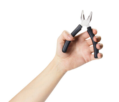 Hand holding combination pliers for repair and construction work, isolated on transparent cutout background
