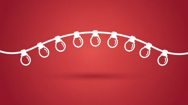 String light garland hangs against a red background.