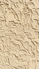 Naklejka premium Textured Beige Wall Surface Close Up Background Abstract