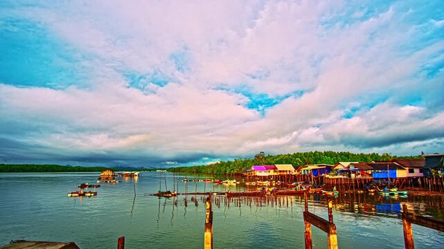 
Traditional fishing community at Baan Sam Chong in Phang Nga, showcasing stilt houses, colorful fishing boats, floating structures, and the peaceful coastal lifestyle of southern Thailand.
