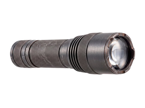 Black tactical flashlight isolated on a white and transparent background. Police patrol equipment.