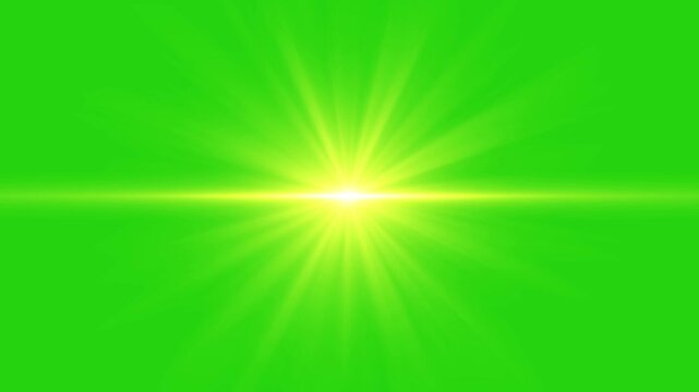 Bright lens flare effect on green screen background. sun rays golden light lens flare green screen alpha channel. Shining star and light rays motion graphics on Green screen