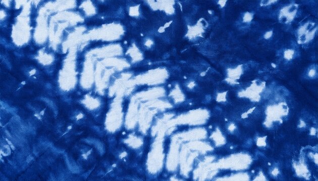 pattern of blue tie batik dye on cotton cloth dyed indigo fabric background and textured painted blue watercolor on white cotton cloth