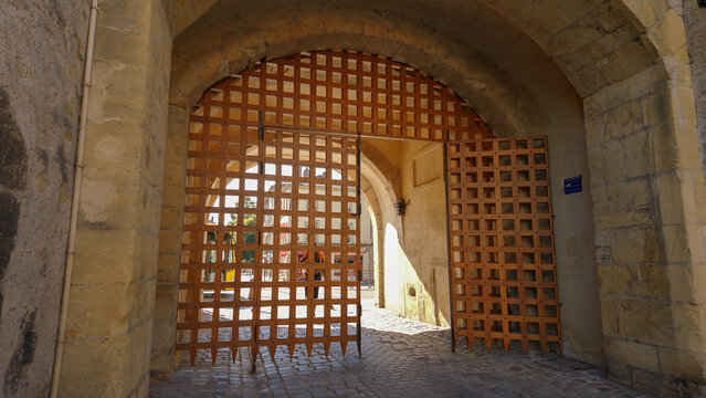 Historic medieval gate of the Porte des Allemands in Metz, France, with open portcullises