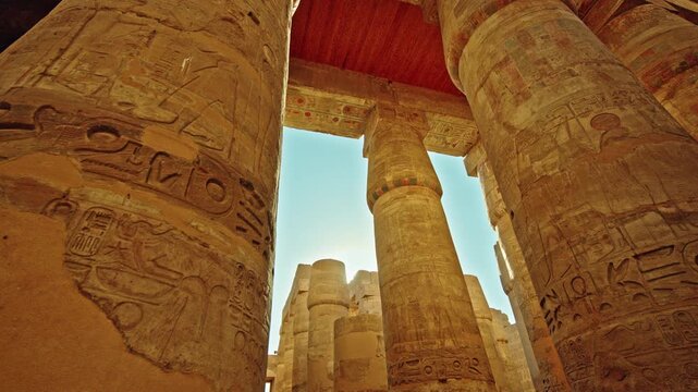 Sunburst Between Hieroglyphic Columns and Painted Ceiling at Karnak Temple