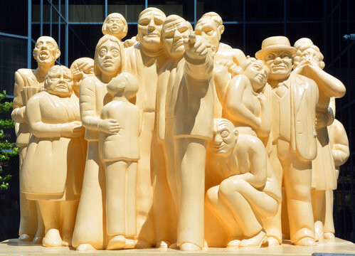 MONTREAL QUEBEC CANADA: The "Illuminated Crowd" is a public sculpture, made in 1985 by artist Raymond Mason from stratified polyester resin with polyurethane paint.