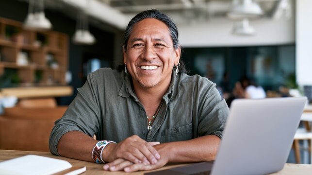Smiling professional man working in modern office environment