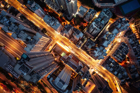Aerial view of Hong Kong city streets at night, China 2024