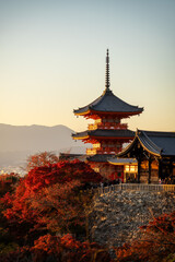 Obraz premium Kiyomizu-dera Temple pagoda surrounded by autumn foliage in Kyoto, Japan, 2025