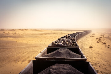 Obraz na płótnie Canvas Mauritania Railway transporting iron ore and livestock through Sahara Desert 2025