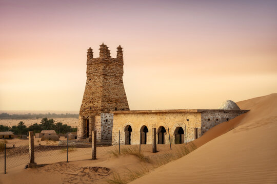 Ancient stone minaret swallowed by sand dunes in Mauritania 2025