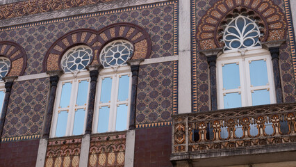 Neo-Moorish tiled facade with horseshoe arches at number 199, Porto, Portugal © Svetlana