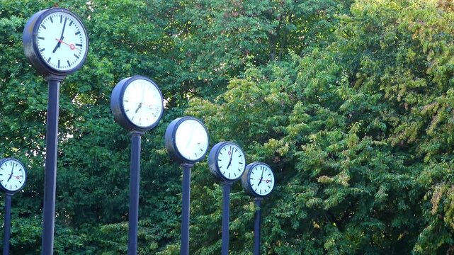 Many clocks or many analog clocks show parallel work and team coordination in global collaboration and international collaboration. Synchronous clocks for time keeping in project management projects.