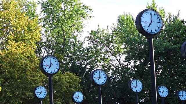 Many clocks or many analog clocks show parallel work and team coordination in global collaboration and international collaboration. Synchronous clocks for time keeping in project management projects.