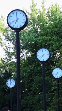 Many clocks or many analog clocks show parallel work and team coordination in global collaboration and international collaboration. Synchronous clocks for time keeping in project management projects.