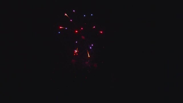 View of colorful fireworks exploding in the night sky during a celebration in Paradise, Pennsylvania, United States.