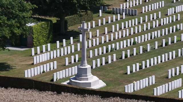 White gravestones rows in military cemetery