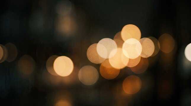Abstract background with golden blurred city lights glowing in the dark night for festive holiday design