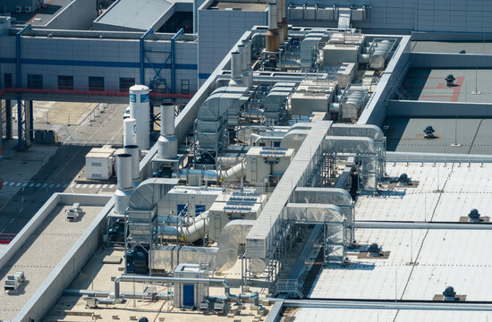 Crolles, France - 01 August 2026: Aerial view of rooftop cleanroom ventilation, air handling units, and industrial ductwork at the STMicroelectronics semiconductor fabrication facility.