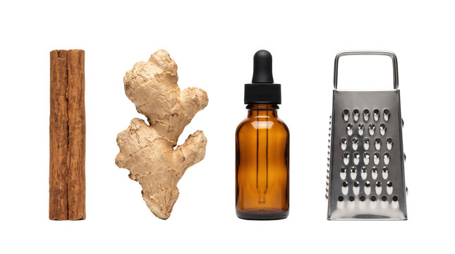 Ginger root set with cinnamon stick, essential oil bottle, and grater