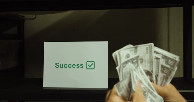 Hands counting cash in front of a success concept. Ideal for business growth, profit, financial success, and entrepreneurship concepts.