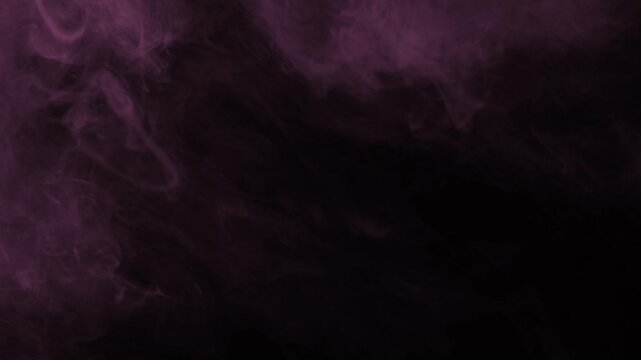 Subtle pink fog wisps curling gently in upper corner on isolated black background
