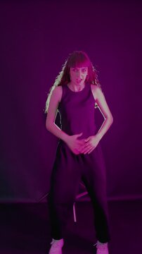 Professional female dancer performing contemporary hip hop choreography