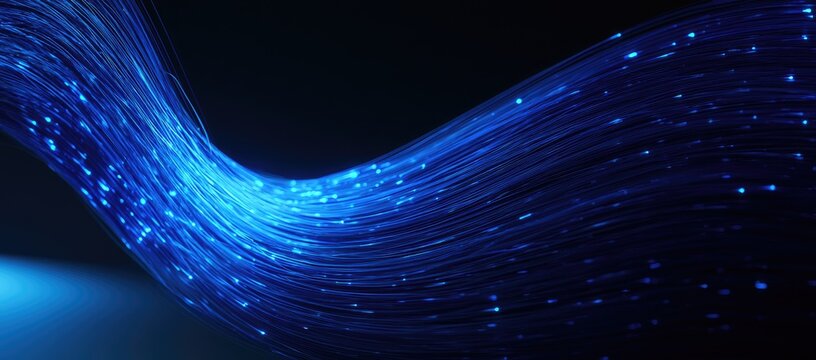 Swirling blue fiber optic strands illuminated with small, bright lights