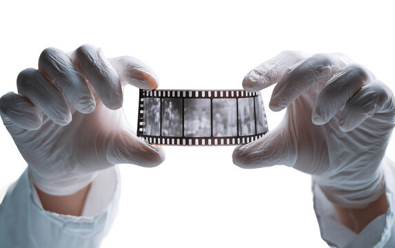 Photographer Carefully Handling Fragile Camera Accessories With White Cotton Gloves During Professional Equipment Preparation Isolated on transparent background PNG