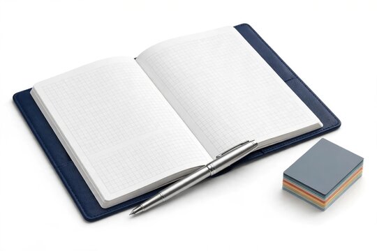 Open notebook, pen, and stack of journals for planning