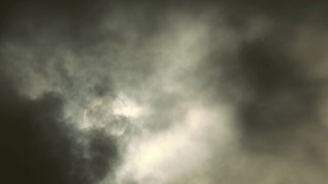 Tokyo,Japan - August 15, 2026: The sun covered with Moving thin clouds in the morning