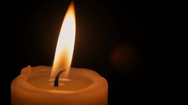 A triptych showcasing the mesmerizing dance of a candle flame against a dark background, with subtle variations in its shape and intensity.