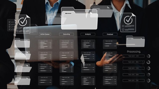 Two business professionals in formal attire engage with technology, illustrating teamwork and digital processes in a modern office environment focused on data management. Raster