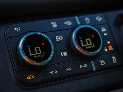 Car dashboard air conditioning climate control panel, copy space