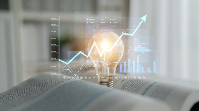 A light bulb symbolizes innovation and ideas as rising graphs showcase growth. An open book represents knowledge in a modern workspace setting, perfect for business themes. Scalp