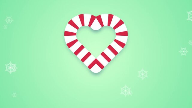 Red Peppermint Candy Heart Spinning With Festive Christmas Lights Background Motion Graphic