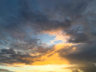 Fototapeta premium Dramatic Sunset Sky With Golden Clouds