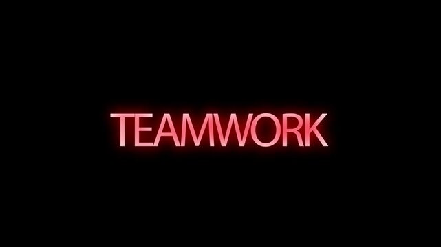 Teamwork text in red glowing neon illumination centers on a dark black background.